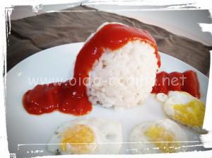 Risotto con huevos de codorniz y tomate